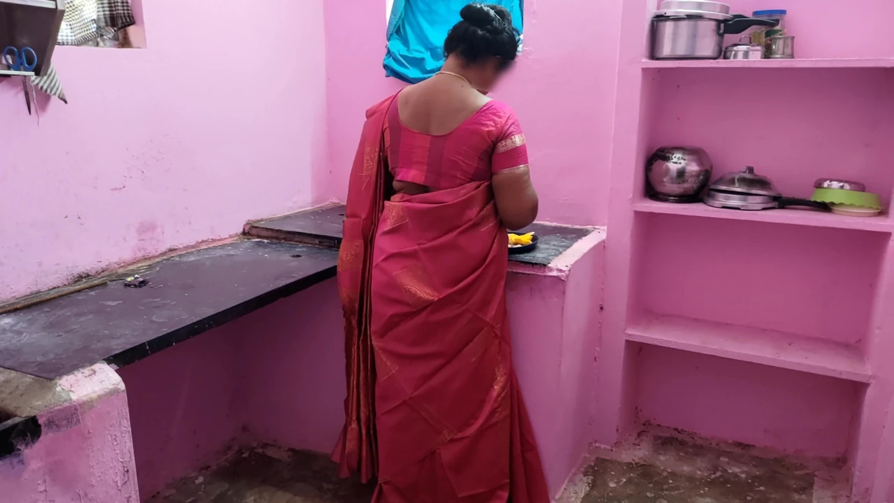 Aunty was searching for a fallen mango in the kitchen and I went behind her and grabbed her rear and licked her pussy wit